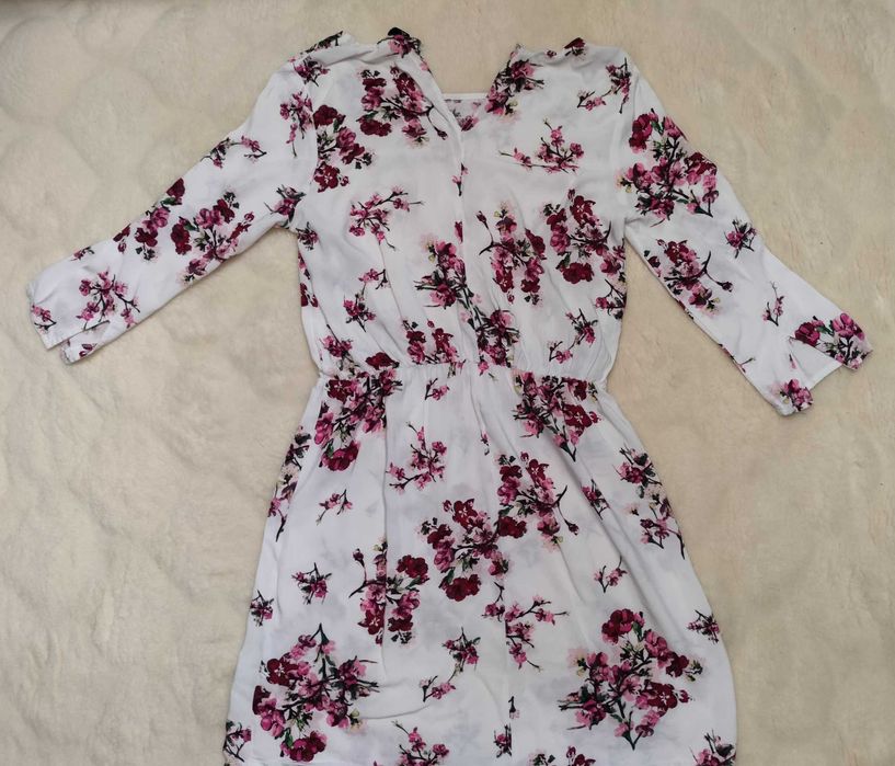 Biała sukienka diwided