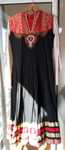 Vestido árabe com calças vermelhas