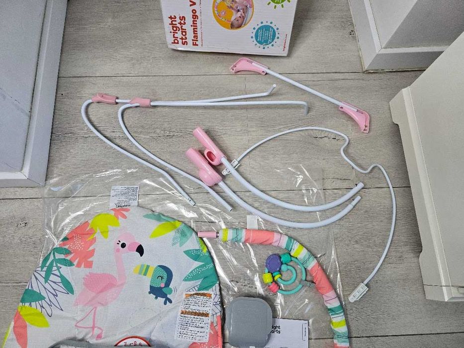 Leżaczek Bright Starts Flaming  z wibracjami pałąk z zabawkami 0m+