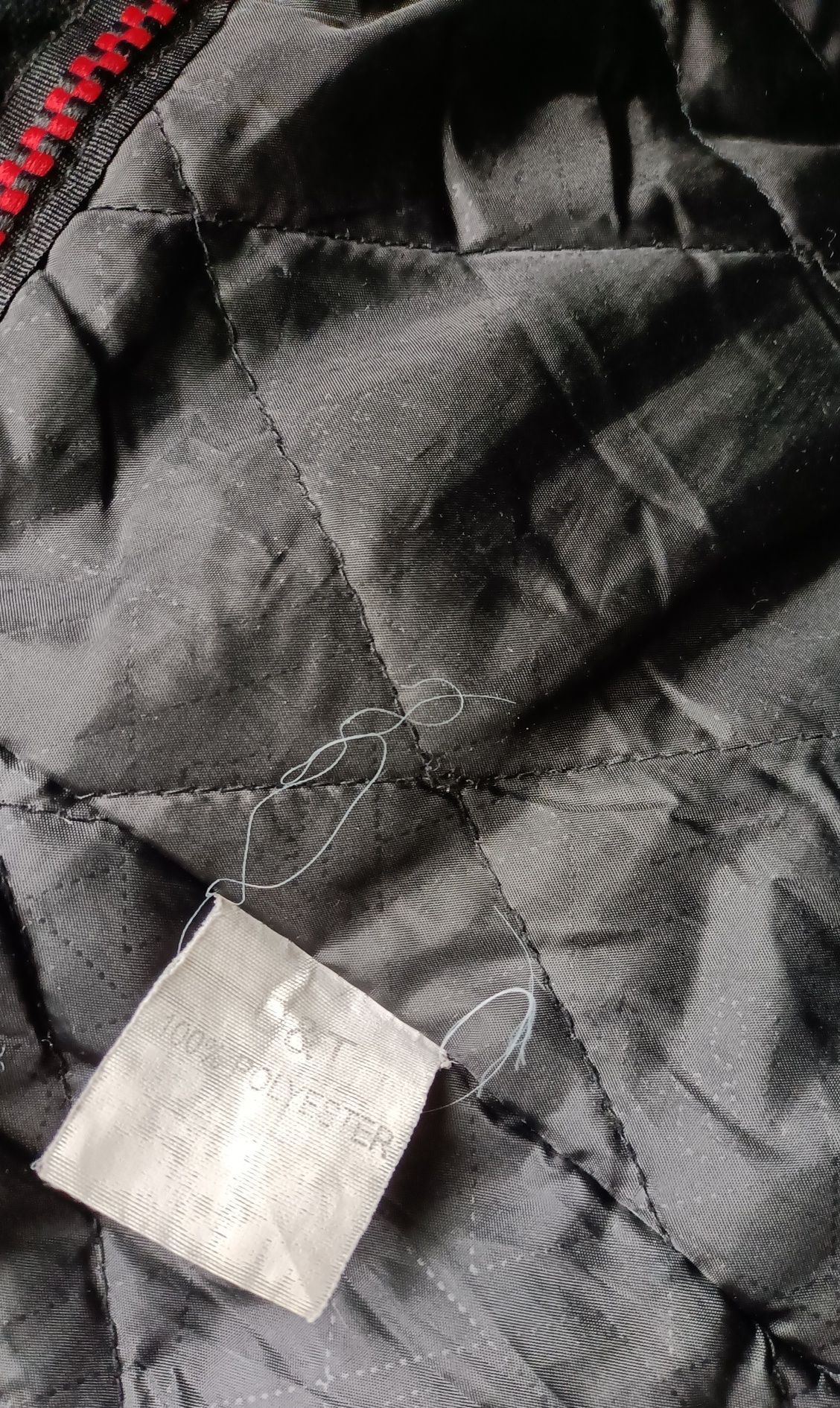 Czarna kurtka zimowa z paskiem. Dt Collection