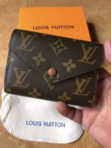 LOUIS VUITTON Victorine Portfele
