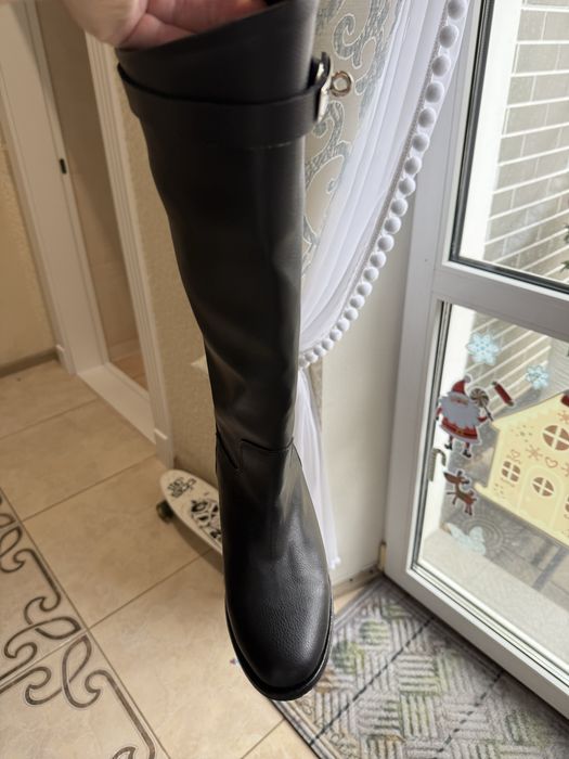 Високі осінні сапоги