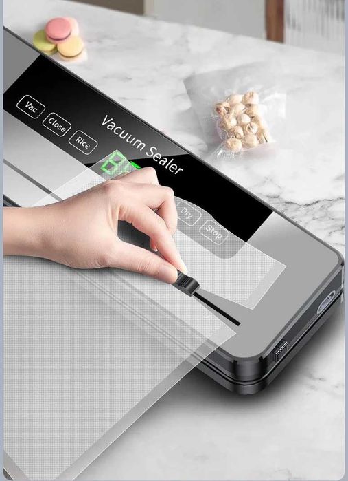 Вакуумный упаковщик