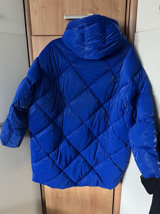 Подовжена зимова стьобана куртка пуховик