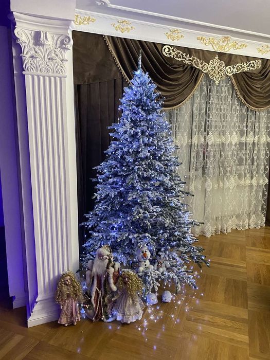 Штучна засніжена ялинка купити