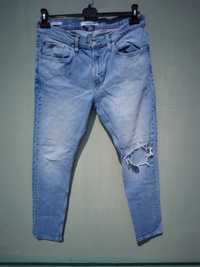 Calvin Klein spodnie jeansy męskie jasne 36x32