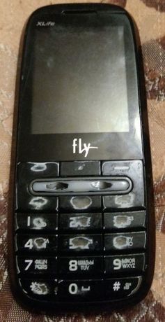 Мобильный телефон Fly.