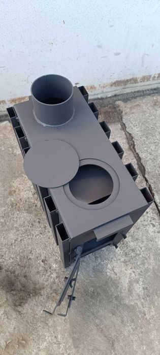 Буржуйка з подвійною камерою горіння на 35 кв м