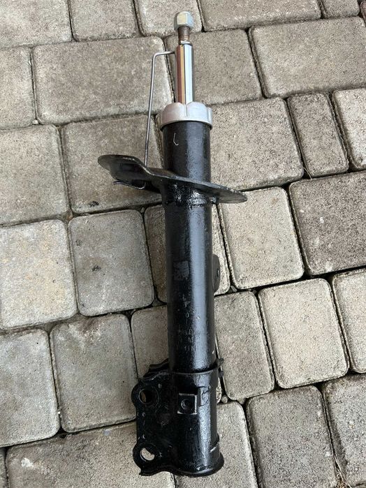 Амортизаційна стійка передня SsangYong Korando (Actyon)