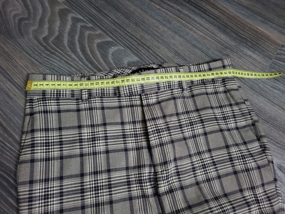 Стильні чоловічі  брюки в клітинку