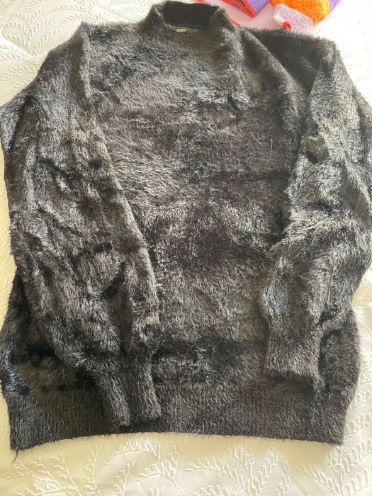 Camisolas e porta moedas