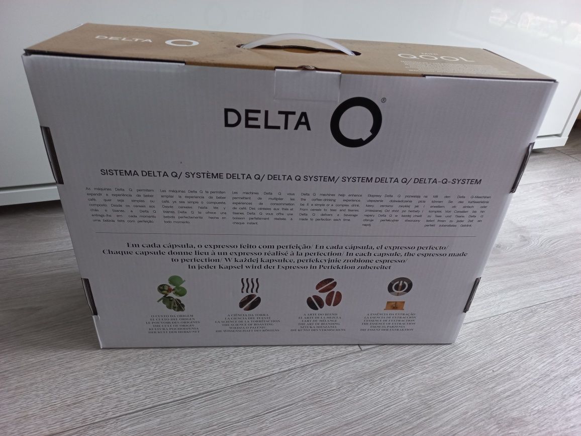 NOWY Delta mini QOOL Ekspres do kawy kapsułkowy podróżny kawa espresso