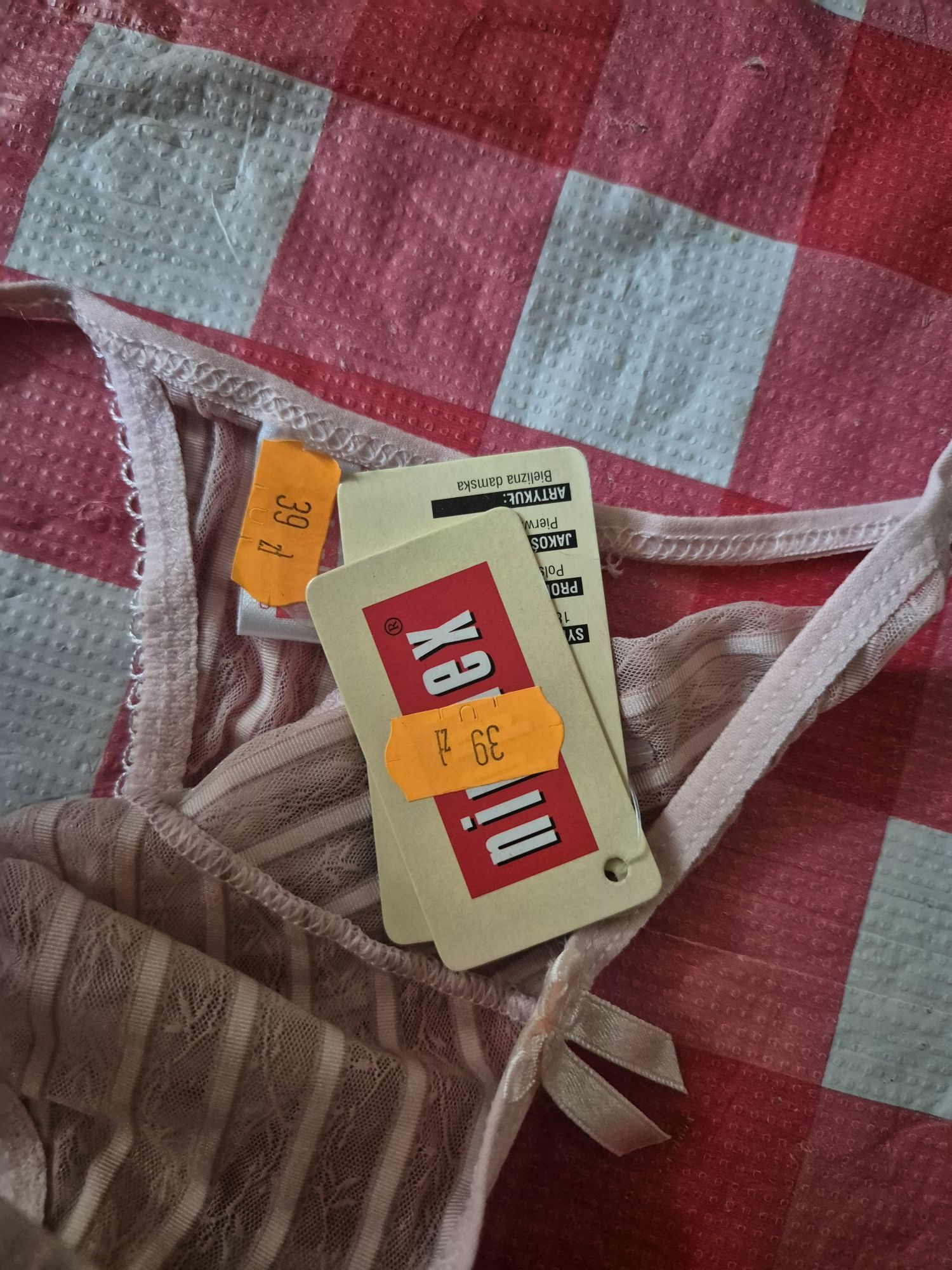 Jasnoróżowe stringi Nipplex rozmiar M nowe