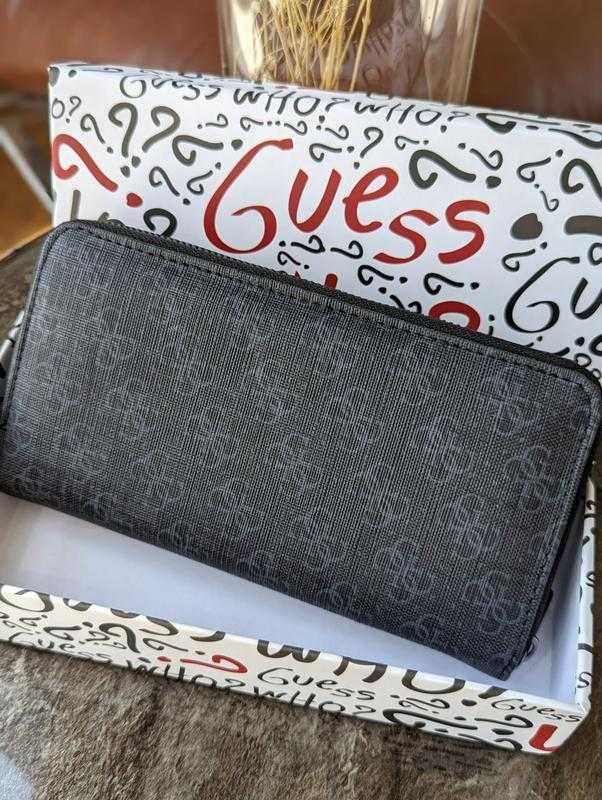 Гаманець Guess великий в сріблі.