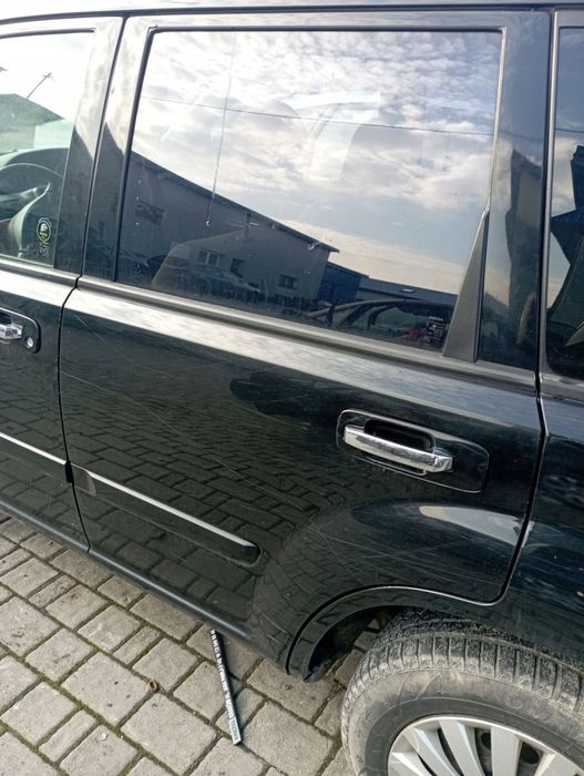 NISSAN X-TRAIL T30 DRZWI LEWE TYŁ TYLNE GOŁE