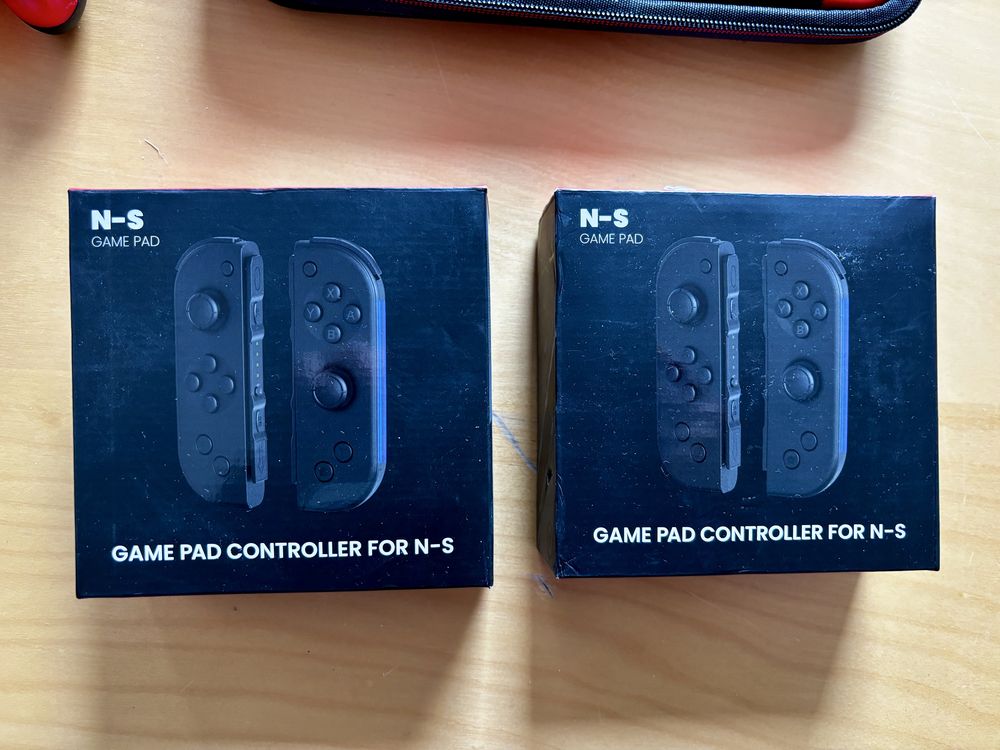 Nintendo Switch OLED + 3 gry i 4 joy cony