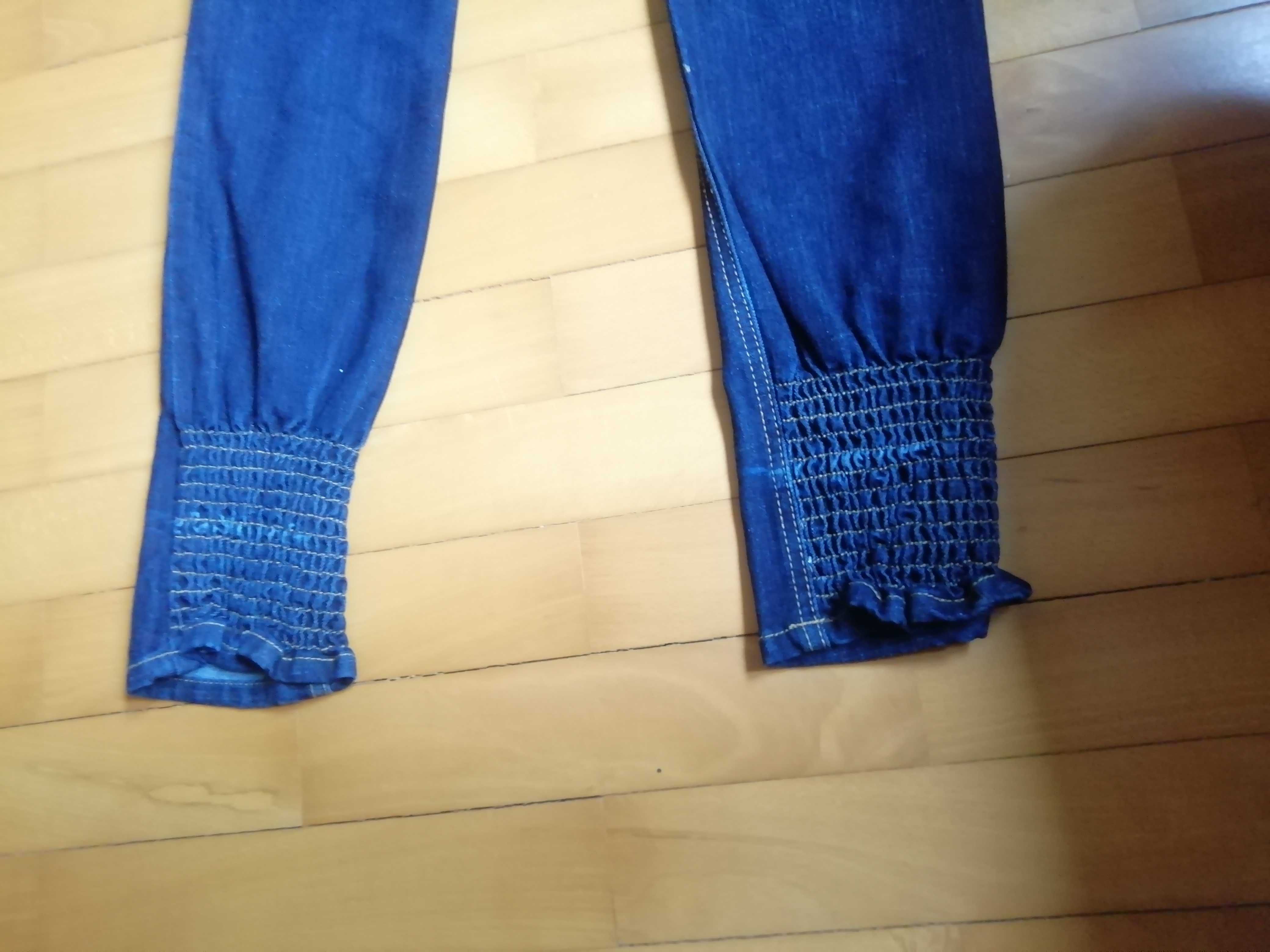 Damskie spodnie jeansowe Blue Rags ze ściągaczami rozm. 38