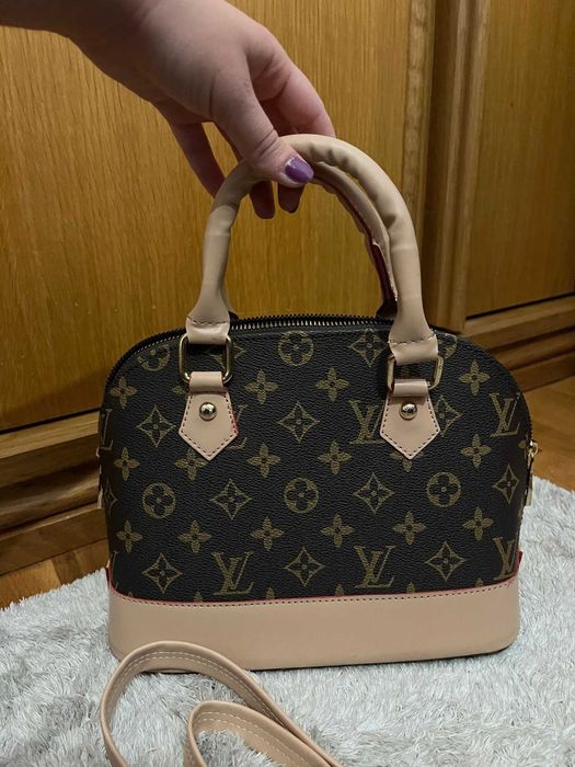Mala Louis Vuitton com duas alças