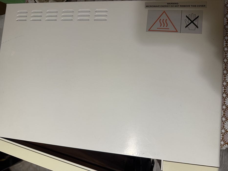 Мікрохвильова піч Candy