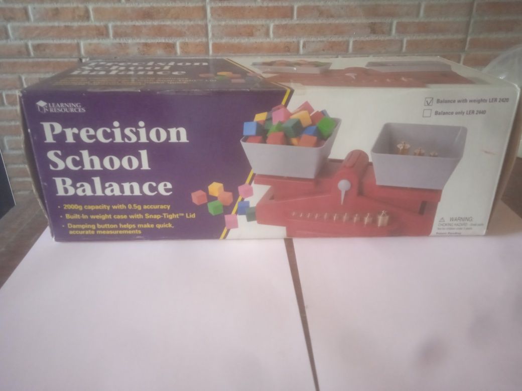 Balança com pesos
