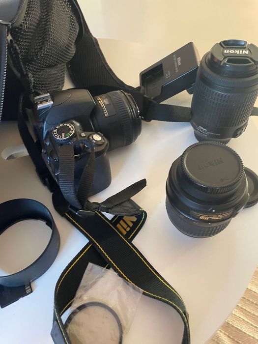 Nikon D3100+lente 50mm f/1.4+lente18-55mm+lente 55-200mm+mochila