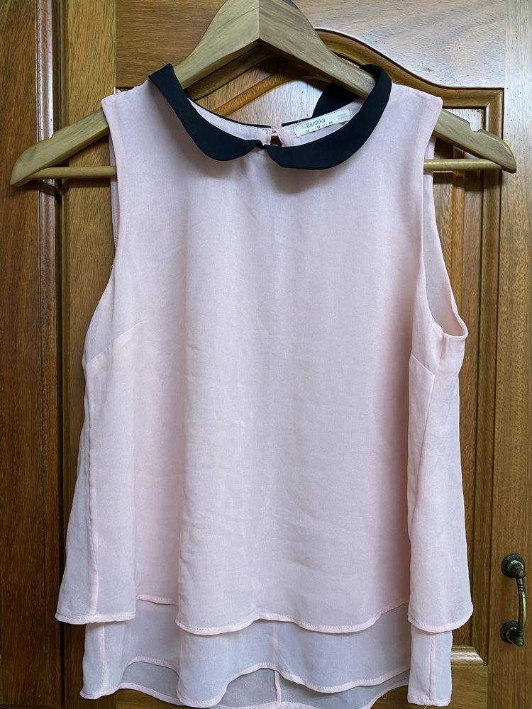 Camisa cava.