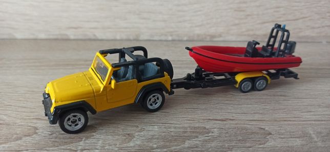 Siku 1658 Jeep Wrangler z przyczepą i pontonem