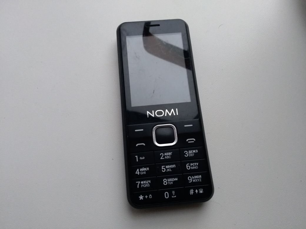Мобильный телефон Nomi