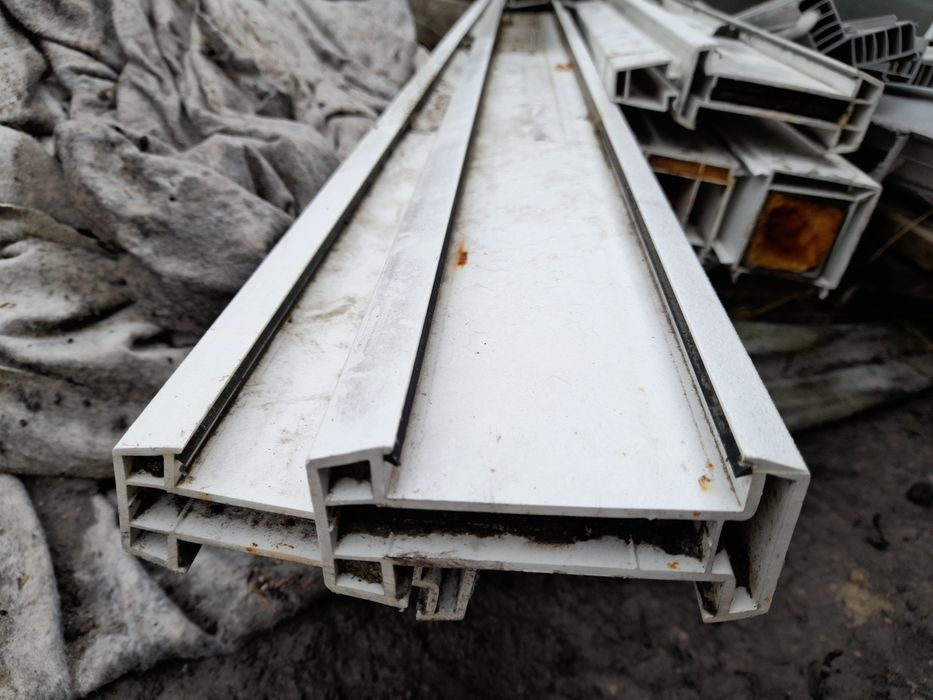 Зєднувальний та розширювальний профілі Rehau для пластикових вікон