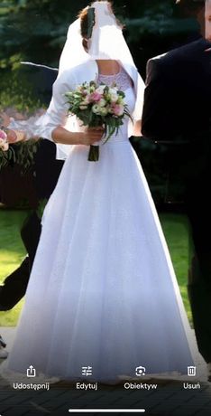 Piękna suknia ślubna  + koło, welon i bolerko