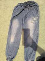 Cienkie jeansy 134
