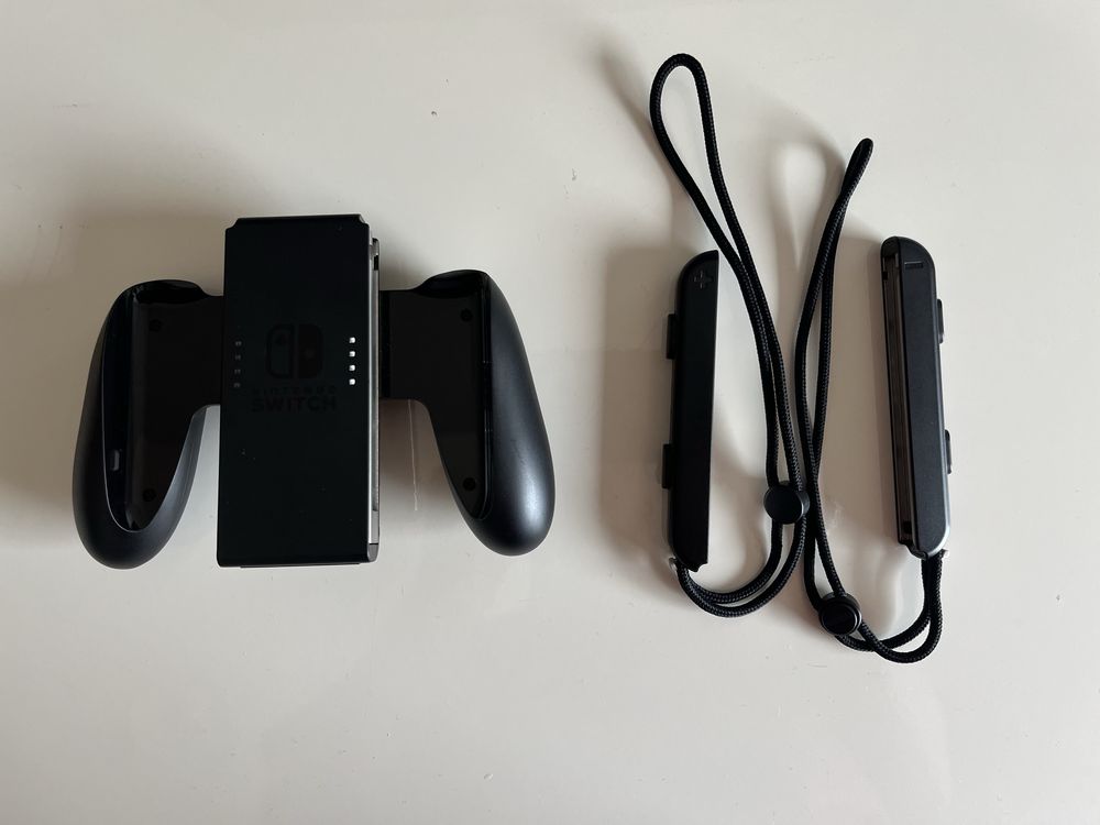 Nintendo Switch 1.1 (V2) Preta + Comando Wireless e Bolsa