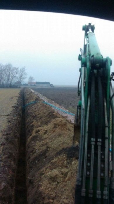 Usługi wodociągowe podłączenie wody przecisk pod drogą koparka mini