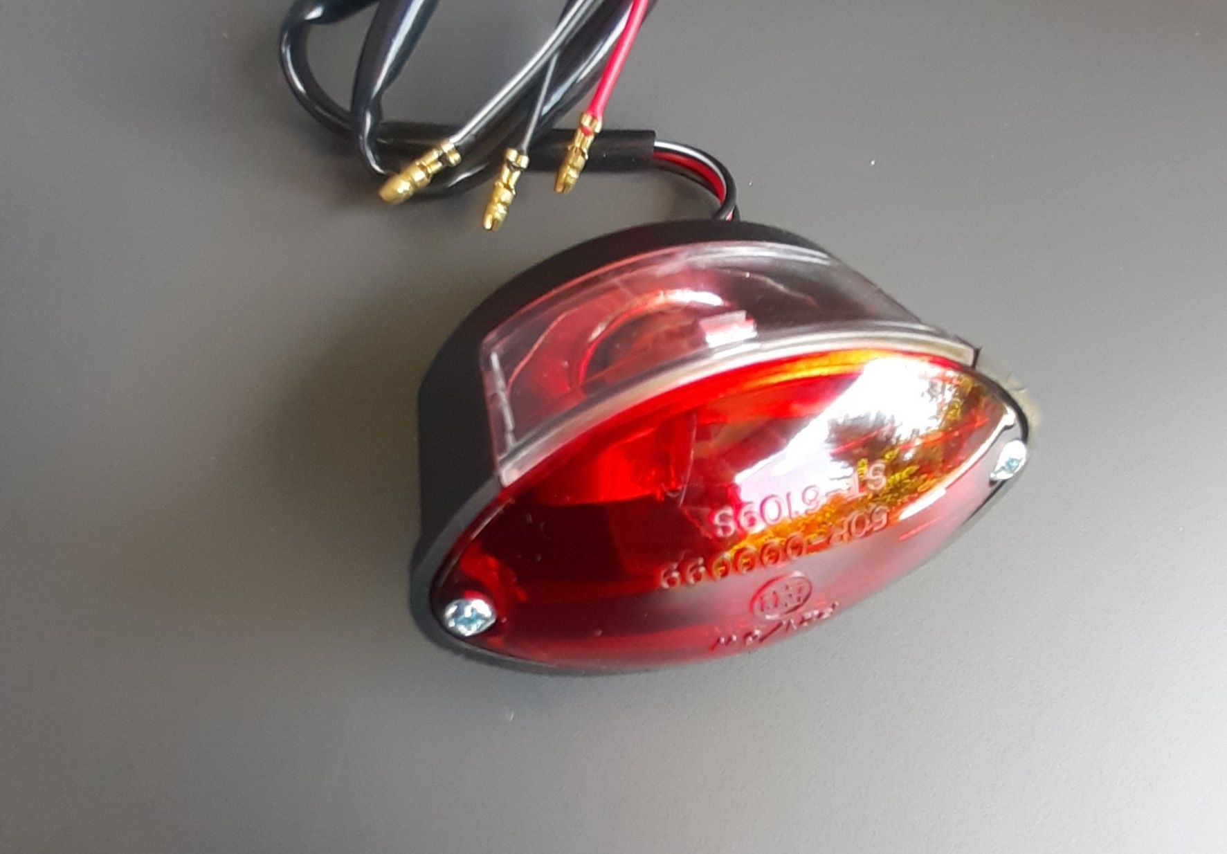 Lampa tylna z oświetleniem rejestracji Mini  Cateye