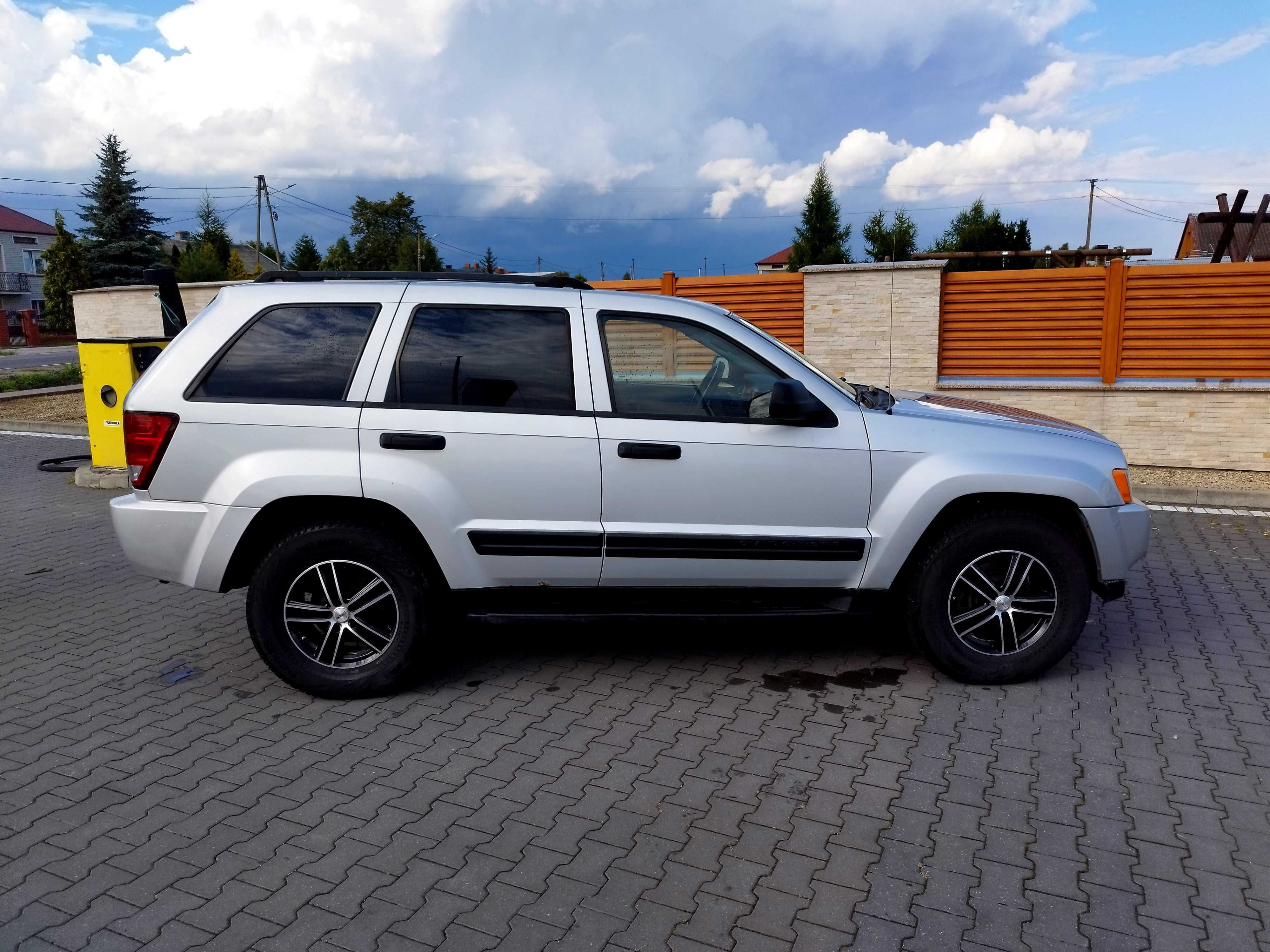 ## Jeep Grand Cherokee ## 3.7 ## Lpg ## Podniesiony ## Dvd