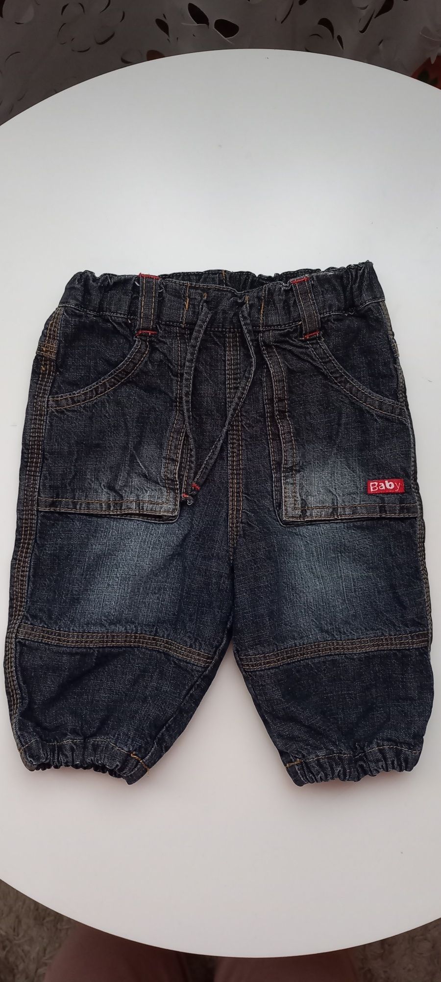 Ocieplane jeansy marki H&M rozmiar 62-68