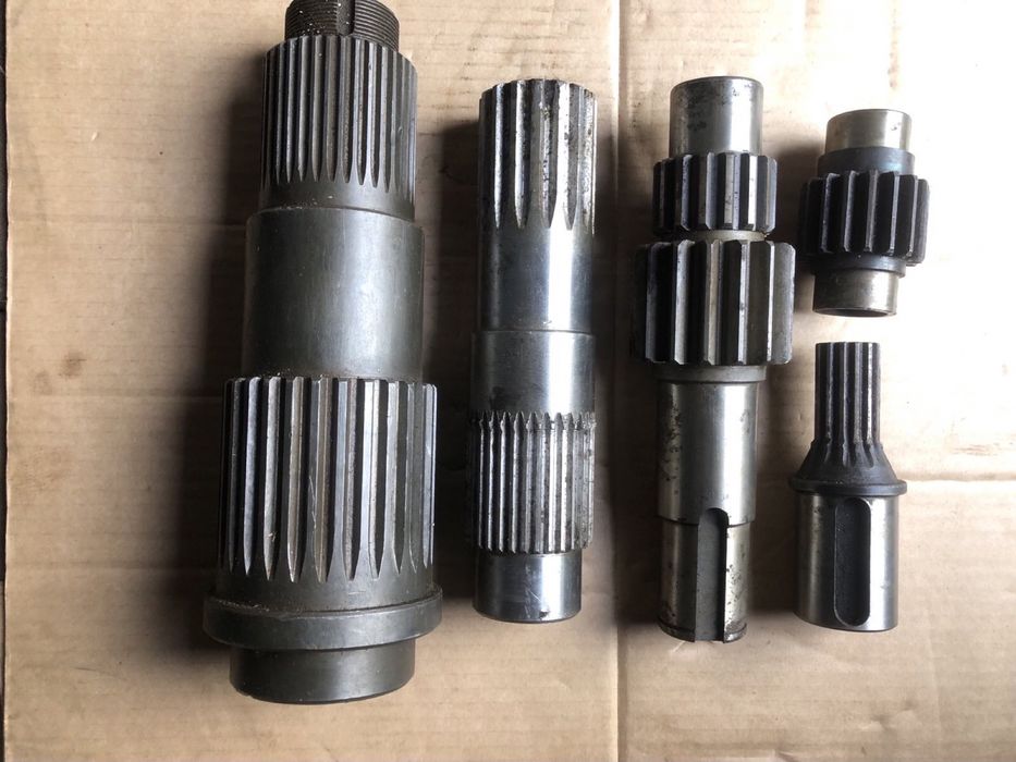 Каток підтримуючий 02.07.08.001 і вали на екскаватор АТЕК 5015.