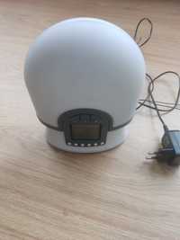 Rádio despertador com lâmpada