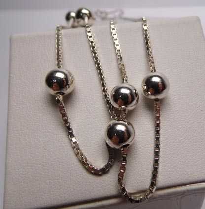 Długi srebrny łańcuszek kostka zdobiona kulkami 83 cm. 1,5 mm.