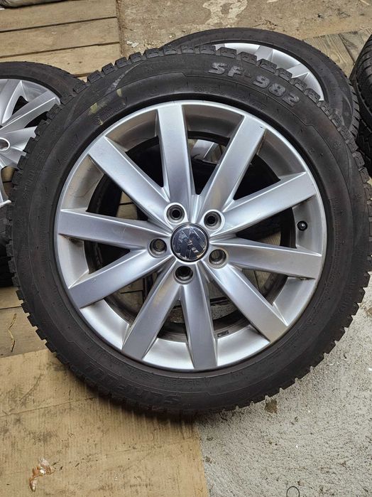 Felgi aluminiowe vw original  opony zimowe Sunfull