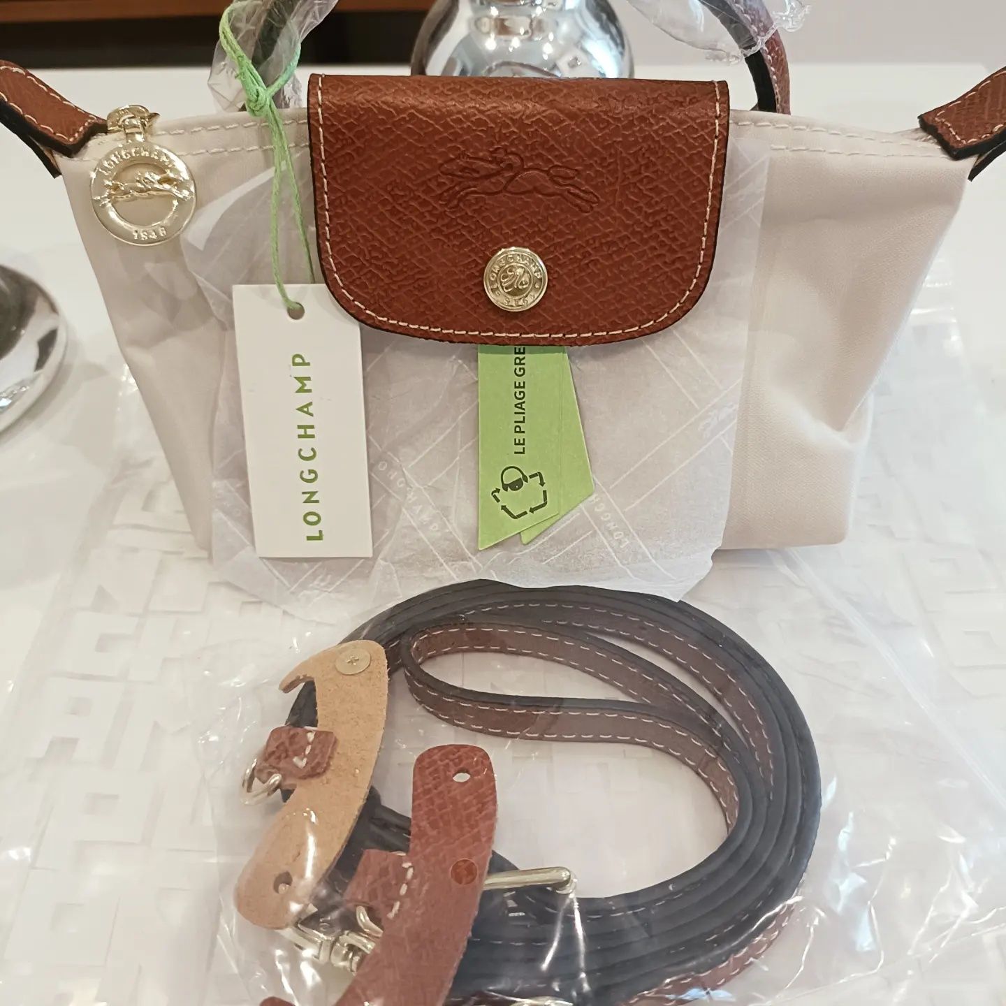 Longchamp XS Beje com alça