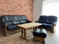 Komplet mebli do salonu - rozkładana sofa, sofa, pufa, stół