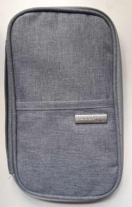 Сумочка-барсетка для города и путешествий.