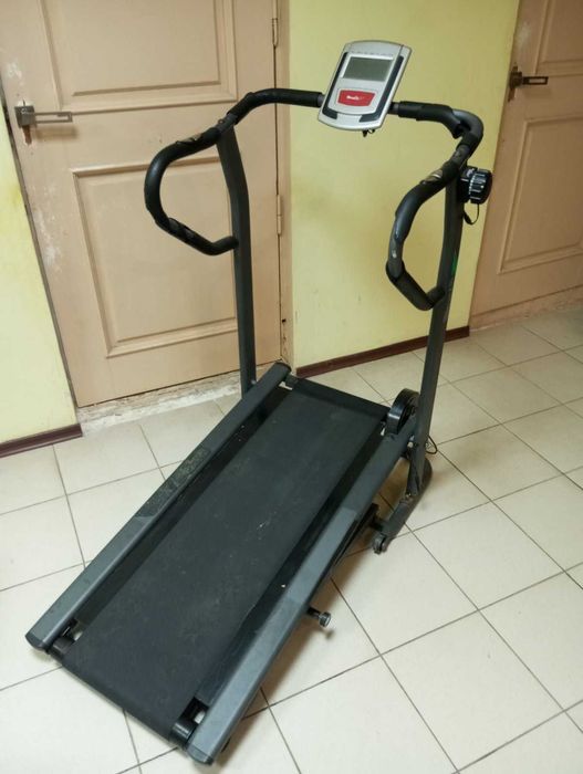 Бігова доріжка механічна