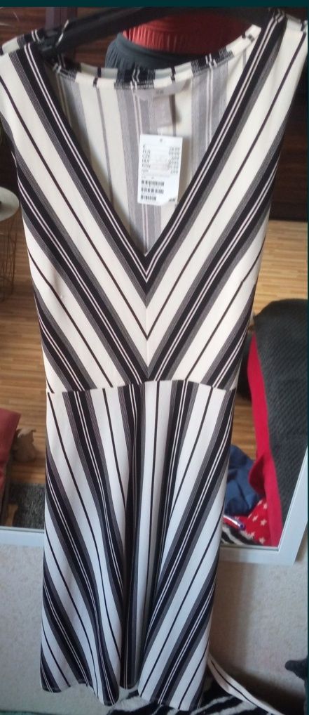 Sukienka biała czarna H&M letnia midi mini w paski M L rozkloszowana