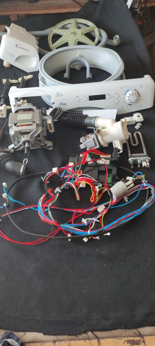 Część z pralki candy model GC 1072D2/1-S. Silnik.,moduł itp.: