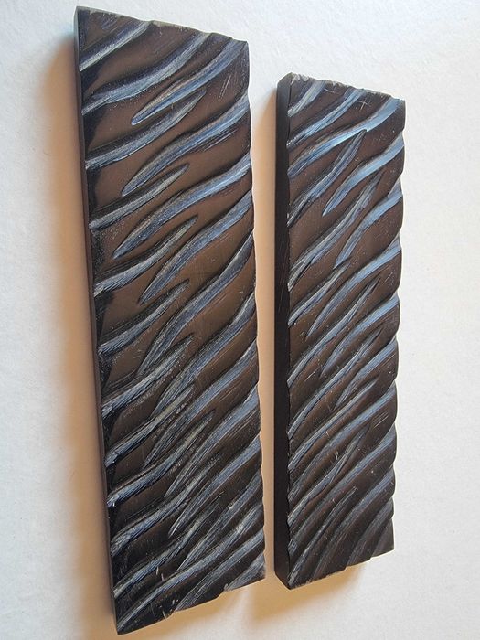 material para facas Talas de Búfalo e Búfalo esculpida