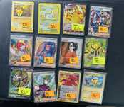 14 oryginalnych kart pokemon w tym psa i pikachu