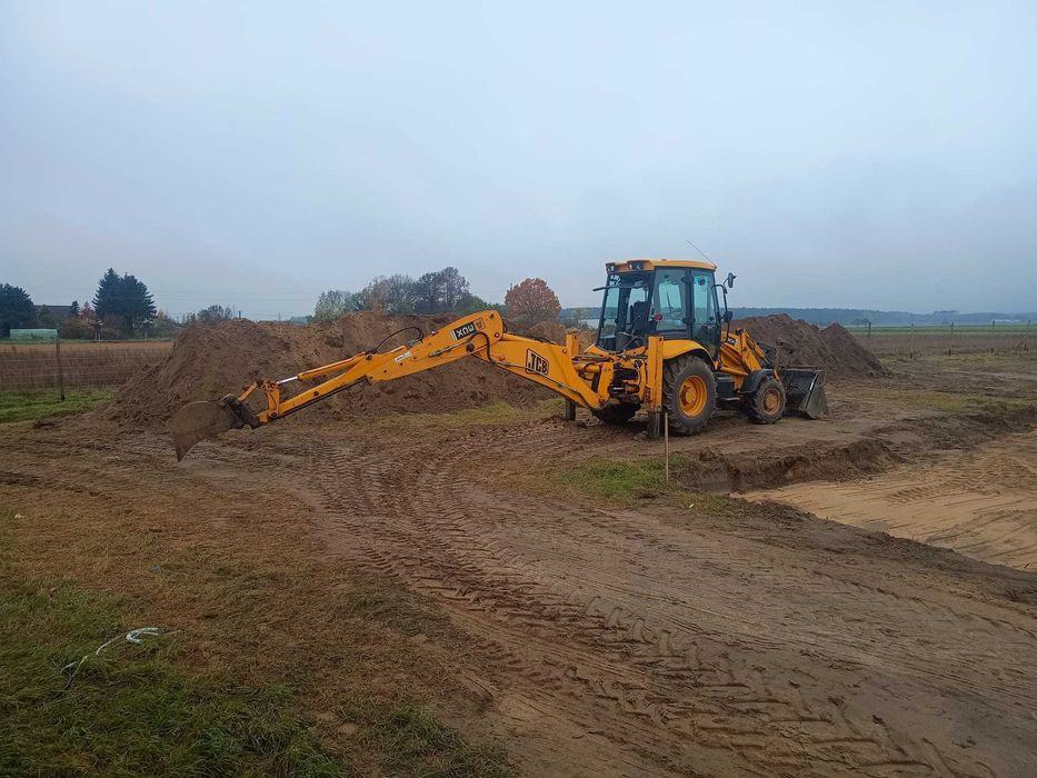 Usługi koparko ładowarką JCB 3CX, roboty ziemne niwelacje wykopy równ.