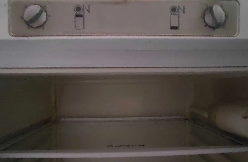 Холодильник с морозильником ARISTON